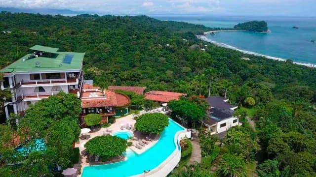 Aerial view of La Mariposa hotel surrounded by jungle