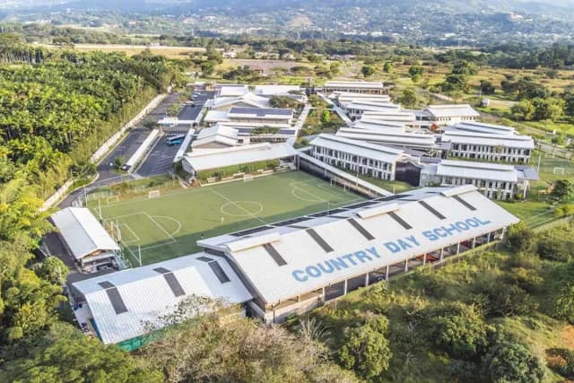Aerial view of Country Day School, boasting top-notch facilities and soccer field