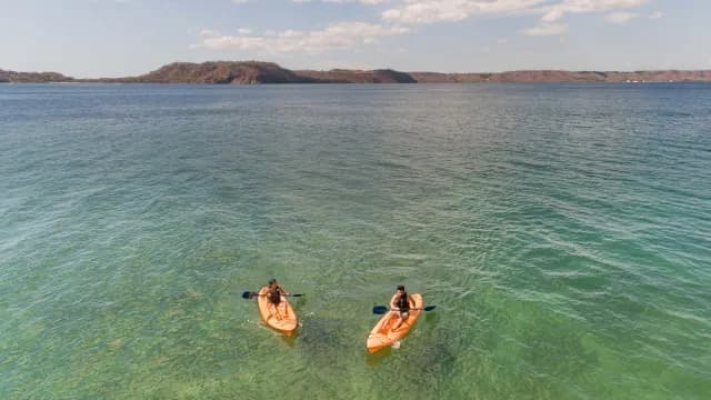 Couple kayaking on the open ocean in Costa Rica